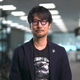 A screenshot of Hideo Kojima looking at you.
